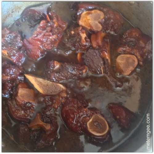 Let pepperpot cook on low to medium heat, until all the meat is falling off the bone tender. This took about 2.5hrs for me. Along the way, I tasted the pepperpot and added about 1/4 cup brown sugar and a pinch of salt. I also made sure the wiri peppers were cut open for additional heat. 